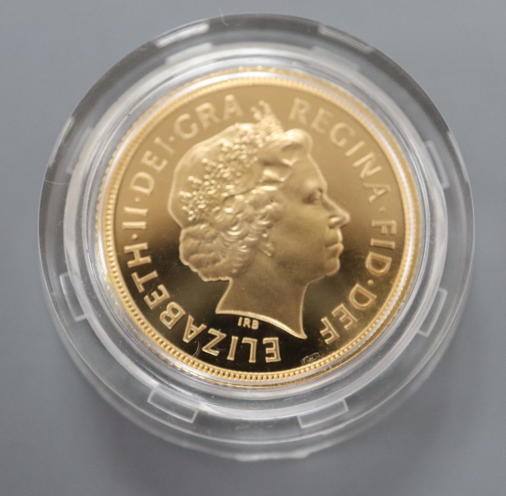 A 2004 gold proof sovereign.